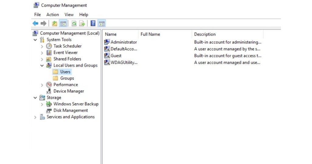 Trong Computer Management, điều hướng đến System Tools, vào Local Users and Groups