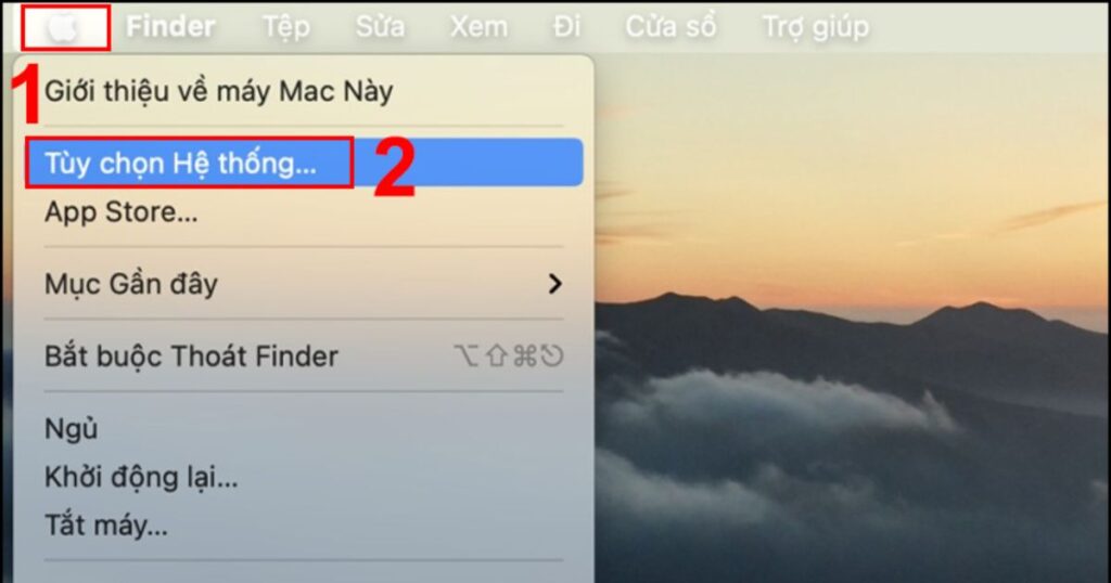 Trước hết, các bạn nhấn vào logo Apple ở góc trên bên trái màn hình và chọn Tùy chọn hệ thống
